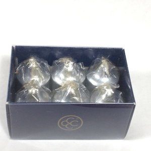 6 silver votive candles